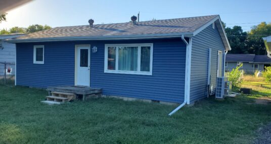 Blue siding on one story home