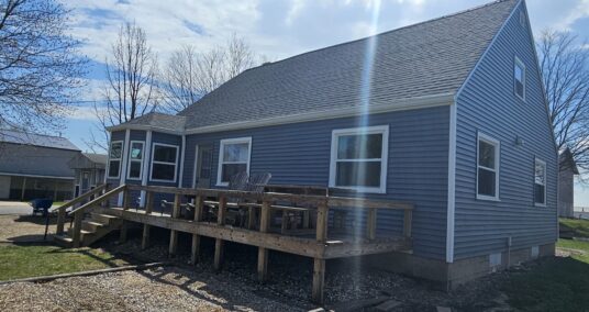 New Blue Siding & Windows