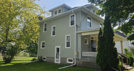 Light Green Siding & Windows