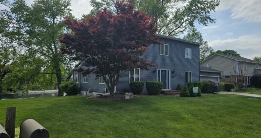 New siding on 2 story home