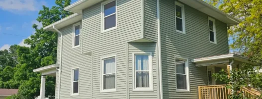 Installation of new vinyl siding, soffit & fascia on a residential home