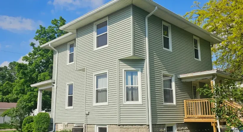 Installation of new vinyl siding, soffit & fascia on a residential home