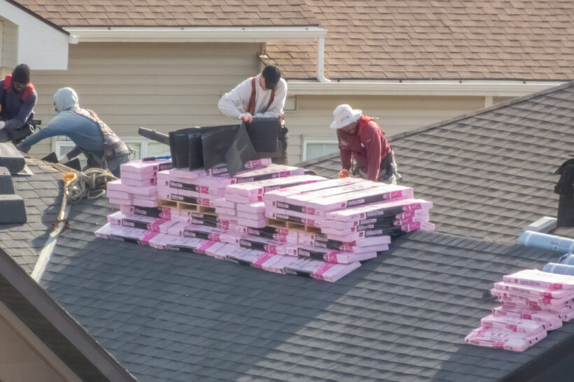 Roofers Pekin IL trusts install new tiles on a roof